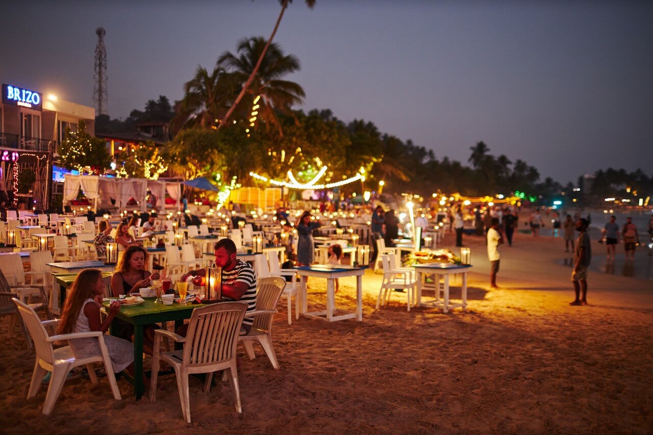 Outdoor-restaurant-beach-sunset - Bali Tour Package